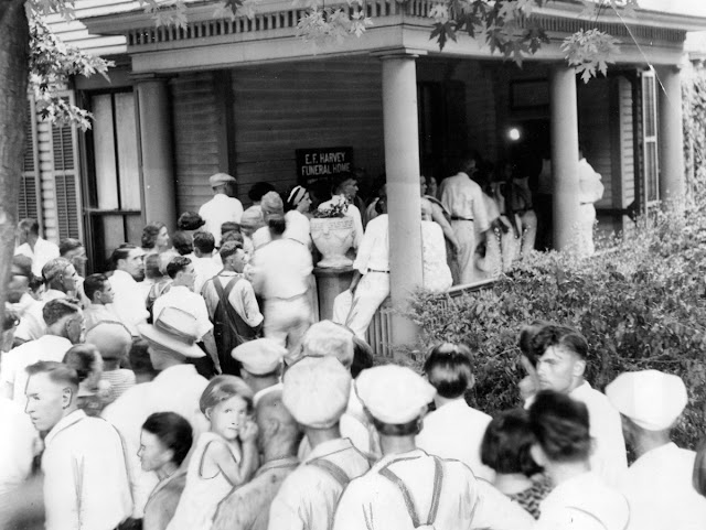Curious Chicagoans Pack the Cook County Morgue to View the Body of Slain Fugitive John Dillinger on July 22, 1934